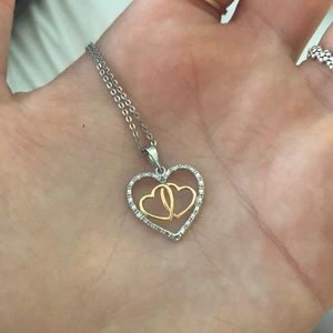 Gorgeous silver, gold, and bronze heart necklace